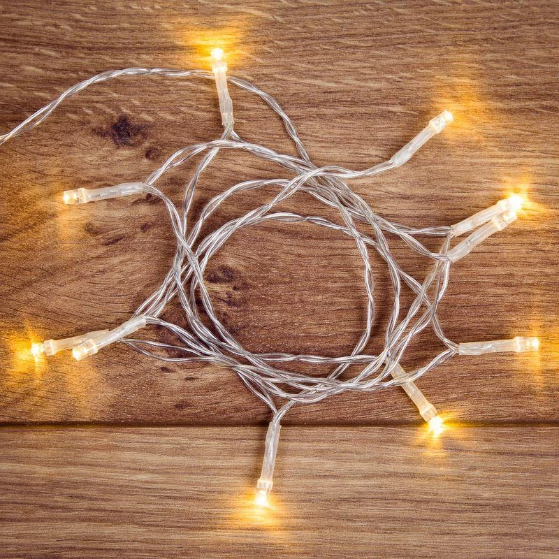 Neon-Night Гирлянда светодиодная универсальная 1.2м 10LED тепл. бел. 0.1Вт IP20 провод ПВХ прозр. элементы питания 2хAA (не в компл.)  303-073